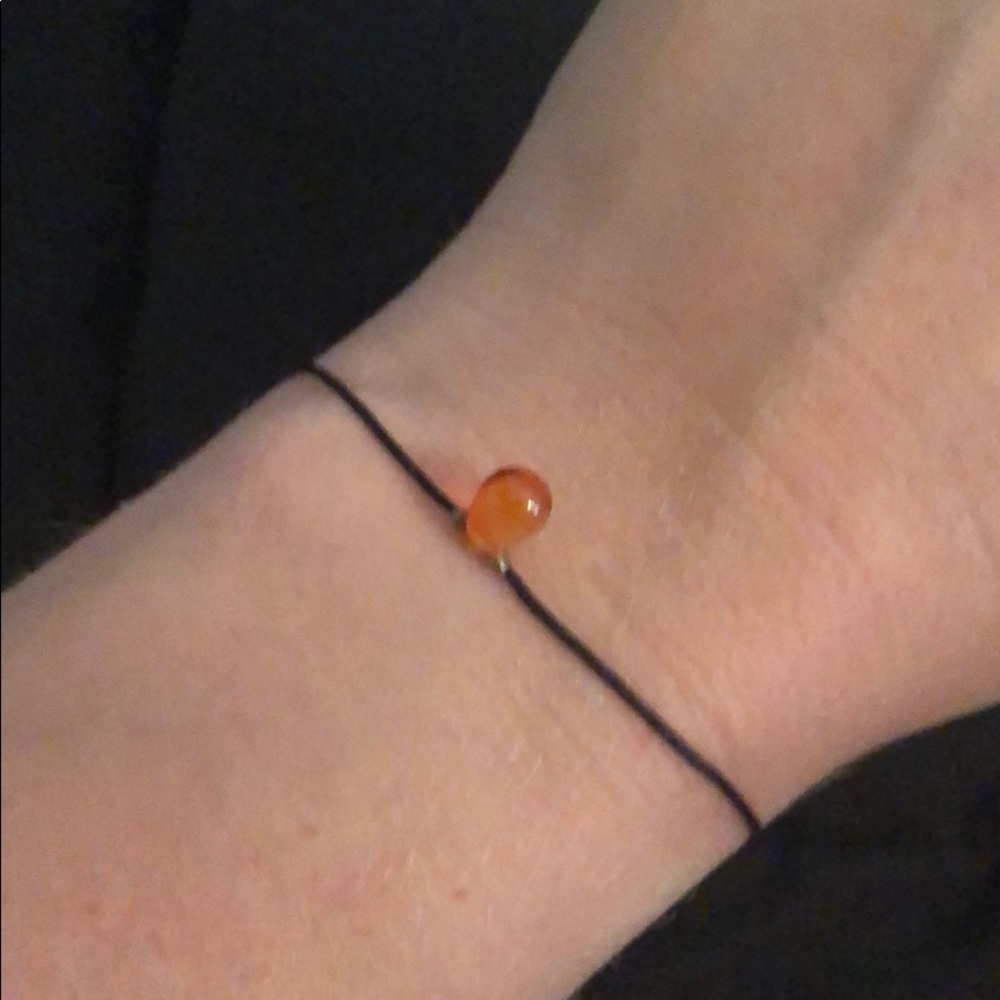 String Bracelet with Single Orange Bead
